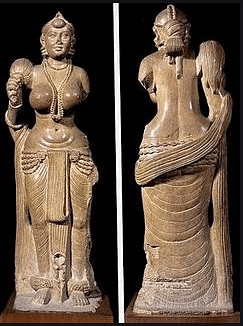 Yakshini holding a chauri (flywhisk) 
