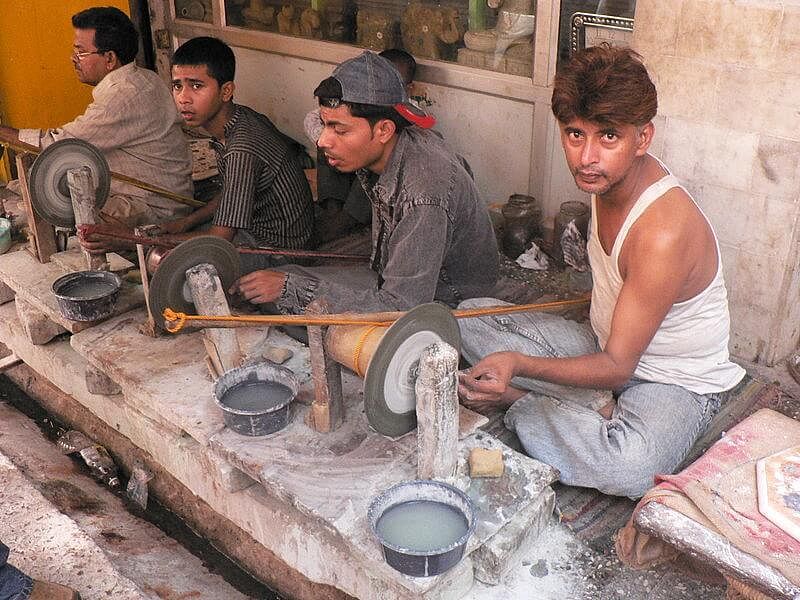 Fig: Labour at an unorganised handicraft manufacturing enterprise. 