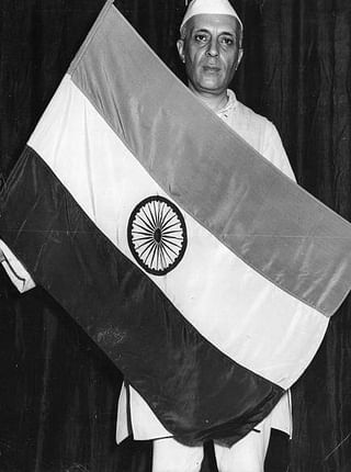 Prime Minister Jawahar Lal Nehru with the Indian flag